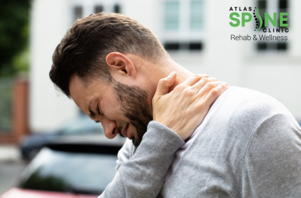 Chiropractor treating neck pain in Scarborough clinic