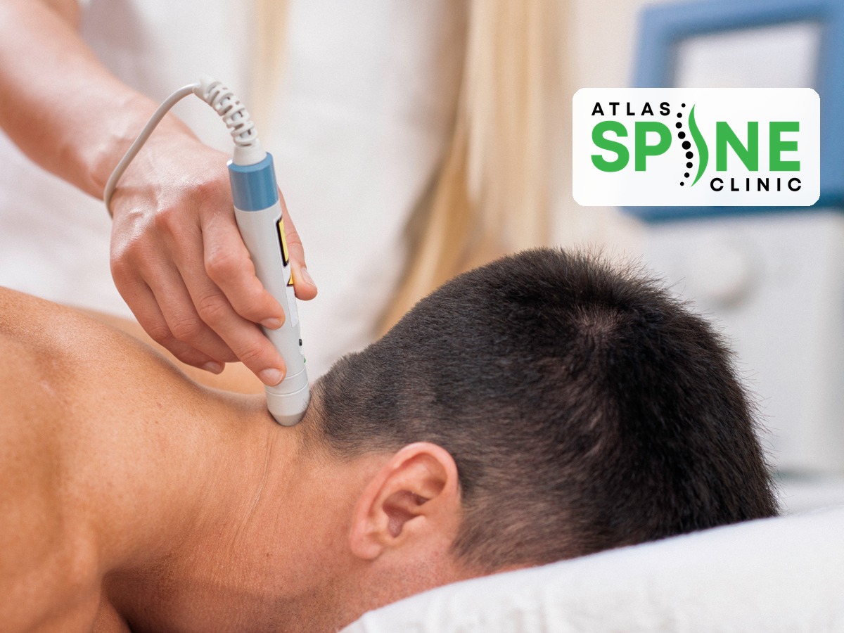 Laser therapy session treating neck pain at a Scarborough clinic