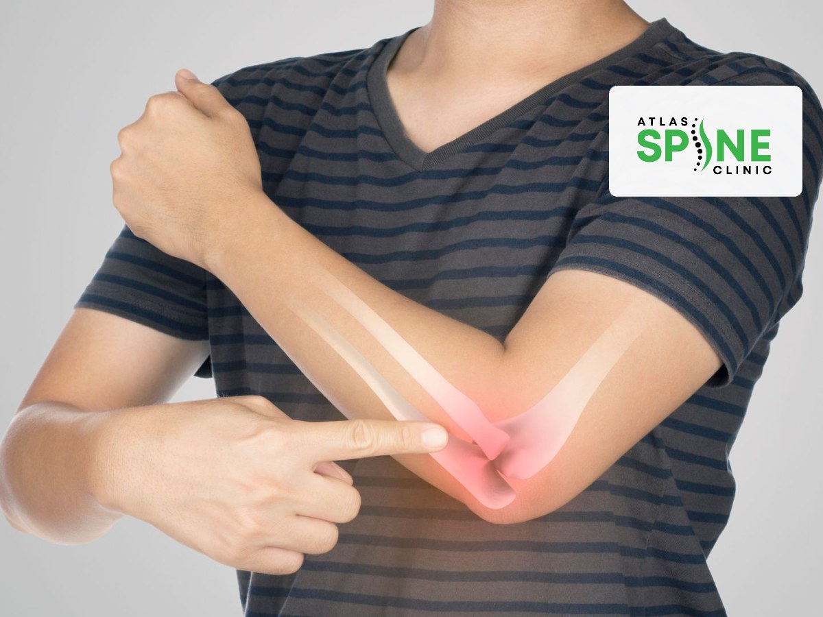Person pointing to their painful elbow with a red glow highlighting the joint, illustrating tennis and golfer's elbow
