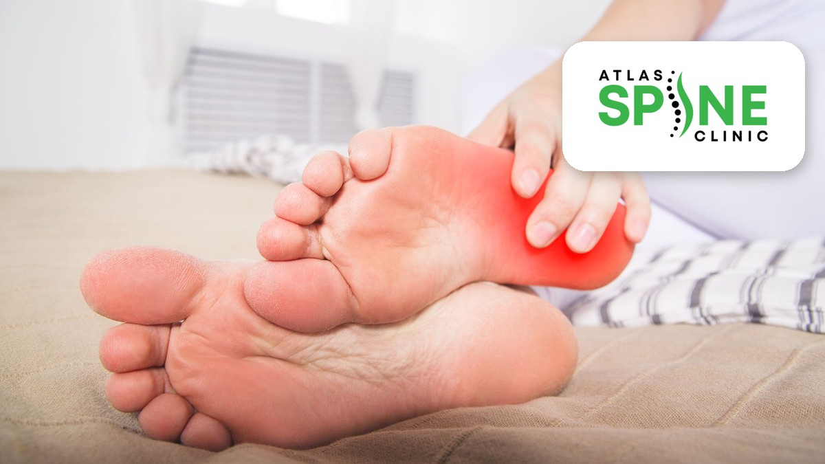 Person holding a painful heel first thing in the morning, typical of Achilles tendinitis