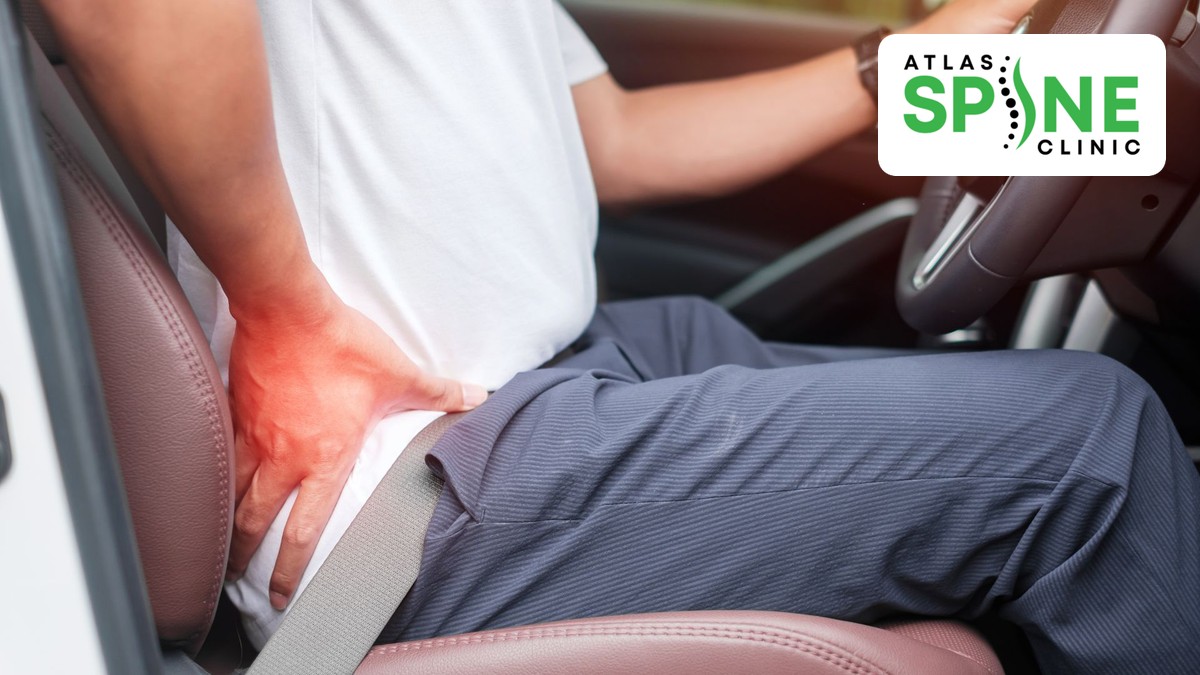 Person holding the buttock in pain while sitting in a car seat