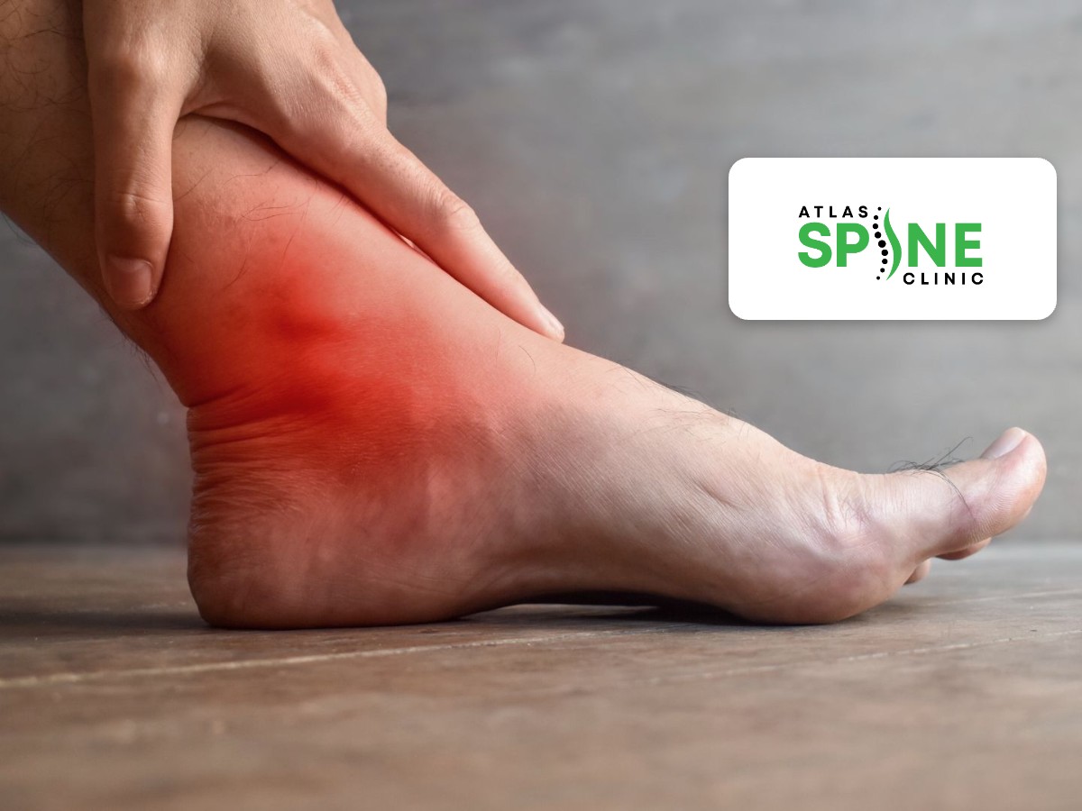 Person holding a sore, swollen ankle after an ankle sprain